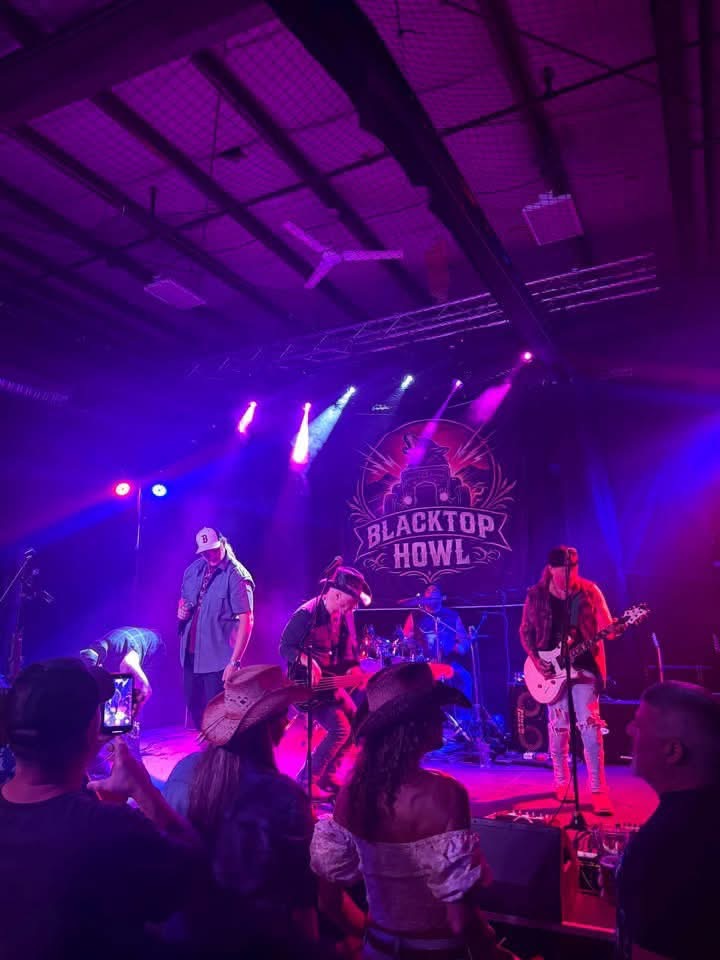 Crowd watching Blacktop Howl play a packed room